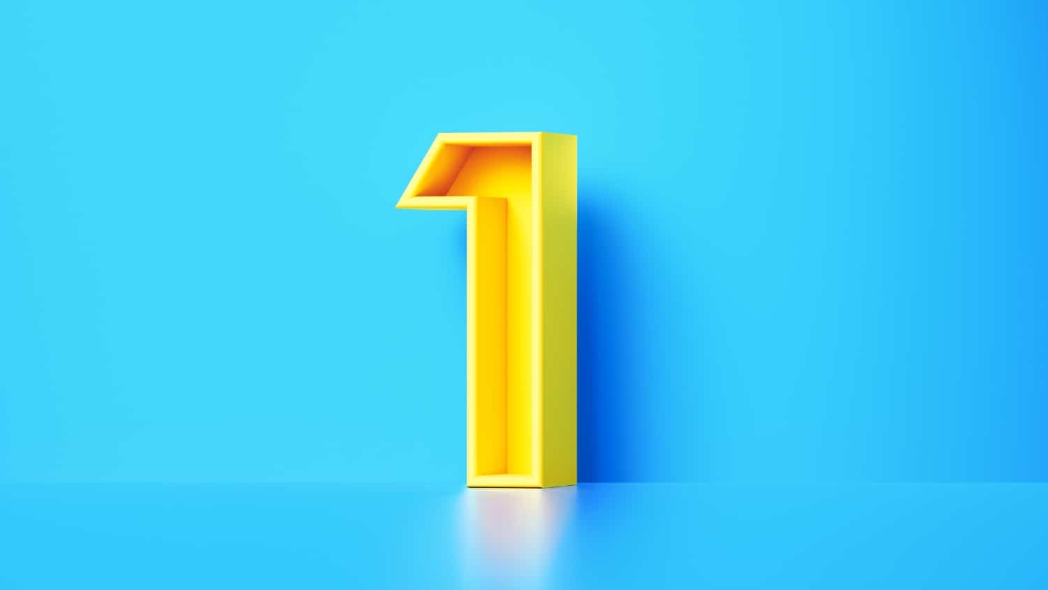 Yellow number one sitting on blue background