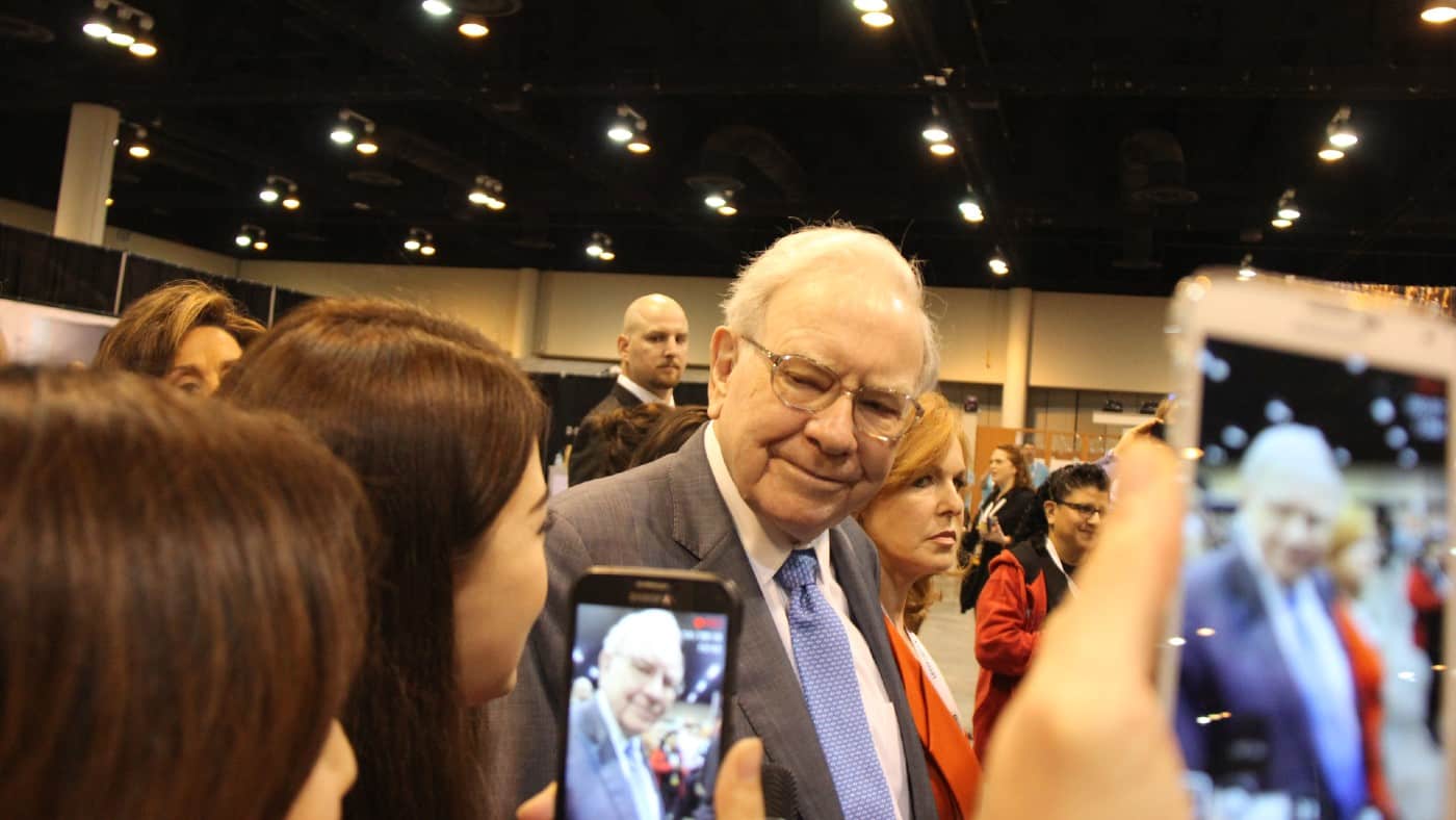 Fans of Warren Buffett taking his photo