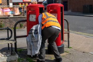 Royal Mail has blamed strike action for helping send it slumping to a full-year loss of more than £1 billion.