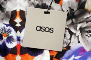 asos optimistic about turnaround despite £380m loss, as inventory cuts and focus on full-price sales drive recovery