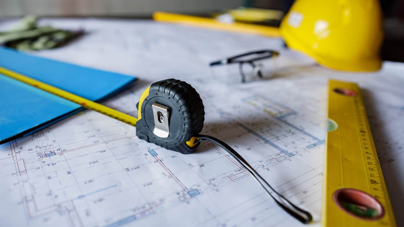 Close up of manual worker's equipment at construction site without people.