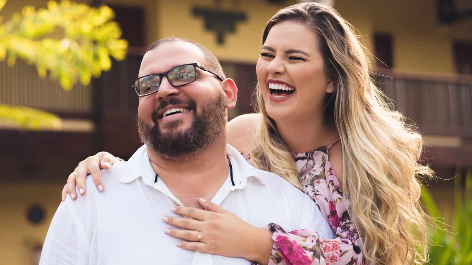 Happy couple showing relief at news