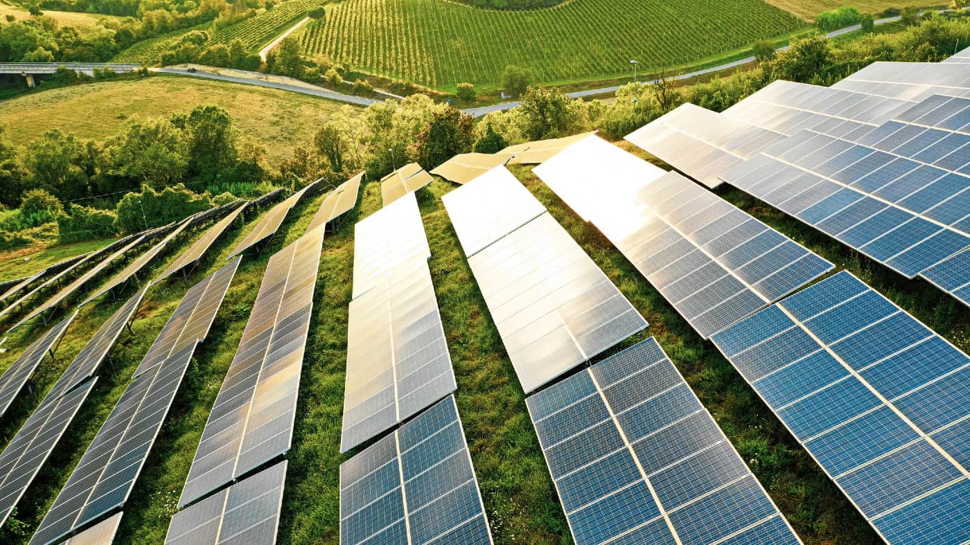 Solar panels fields on the green hills