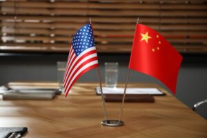 US and Chinese officials meet in London to discuss easing trade tensions, as Asian stock markets rally on hopes of a breakthrough.
