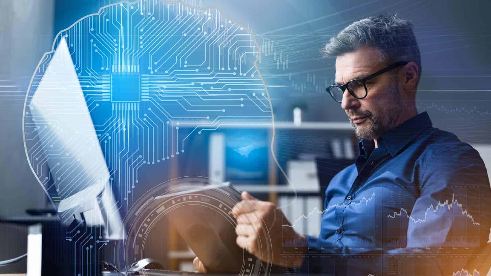 Man reading a tablet, with a wired brain and stock charts in mind