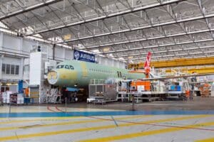 Airbus is facing the prospect of a global production slowdown after workers at its flagship UK site voted overwhelmingly to strike in a dispute over pay.