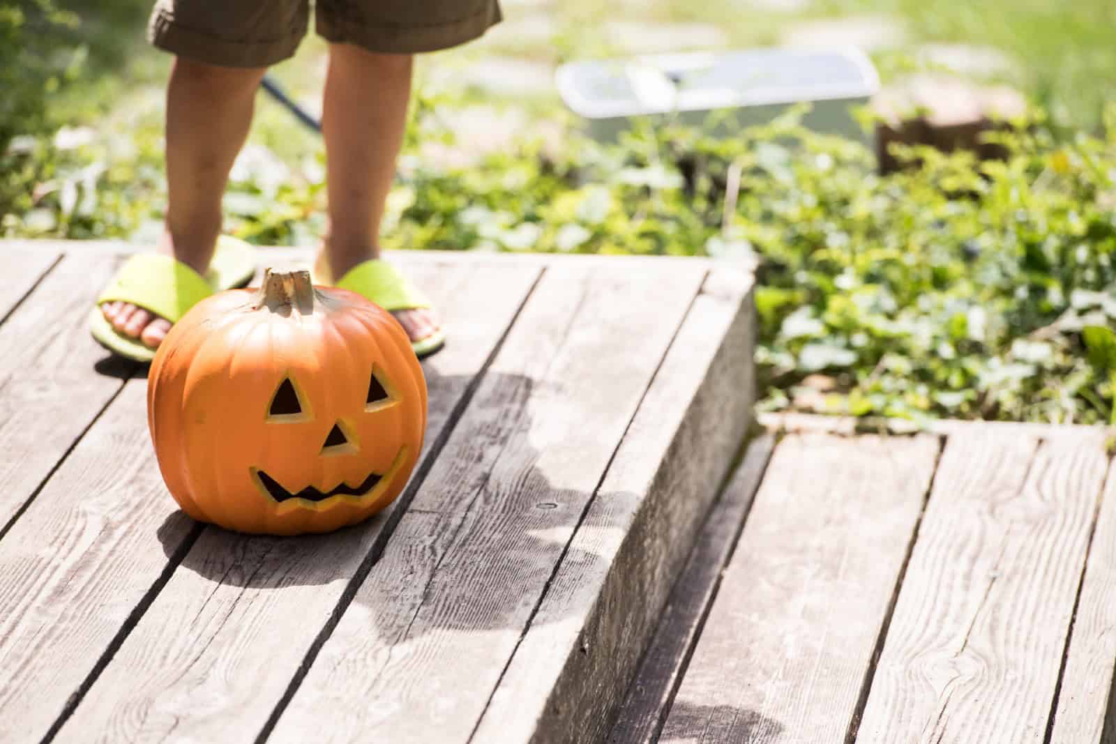 A picture of a house decorated on the day of Halloween.