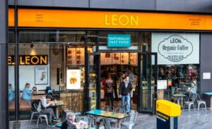Leon’s co-founder John Vincent is in discussions to buy back the fast-food brand from Asda, in a move that could see him reclaim control of the chain for less than a third of its 2021 sale price.