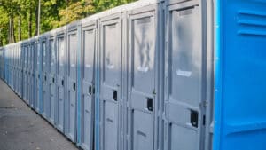When considering portable sanitation, the immediate mental image is typically one of construction sites, with their iconic plastic units positioned near heavy machinery.