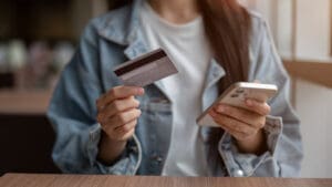 Britons turned to their credit cards at the fastest pace in almost two years in the run-up to Christmas and November’s Budget, even as signs emerged that households were becoming more cautious elsewhere.