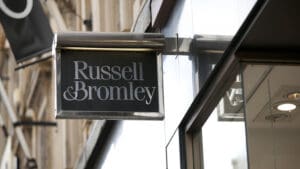Next has bought the upmarket shoe and accessories brand Russell & Bromley out of administration in a £2.5 million deal, but the majority of the chain’s shops and hundreds of jobs remain at risk.