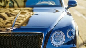 Bentley is to cut 275 jobs as the luxury carmaker grapples with a sharp decline in profits and mounting pressure from a weakening global market, underlining the growing strain even at the very top end of the automotive sector.