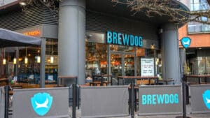 BrewDog has been sold to US cannabis and craft brewing group Tilray in a £33 million rescue deal that will safeguard hundreds of jobs but see 38 bars close with the loss of 484 roles.